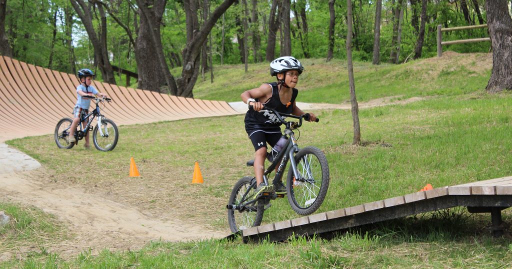 Boy riding a bike on the Jay Dix Mountain Bike Skills Course