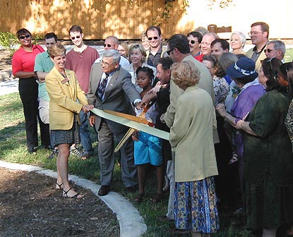 people cutting ribbon at Field Park