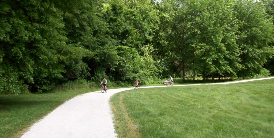 Cyclists Enjoying Hinkson Creek Trail