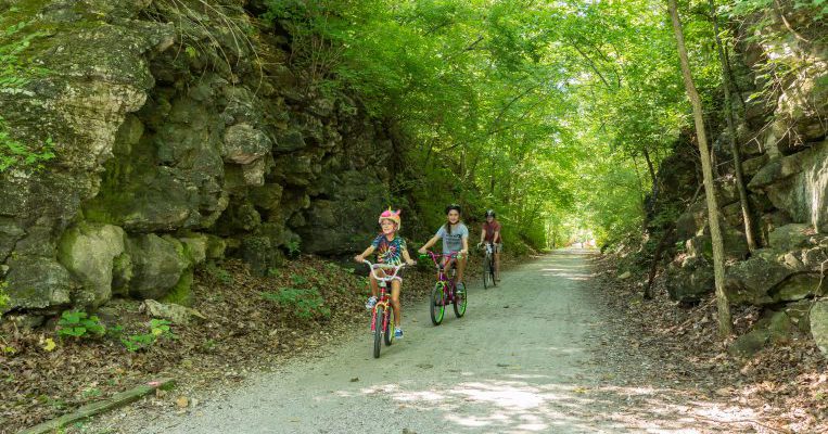 Bikers on the MKT Nature and Fitness Trail