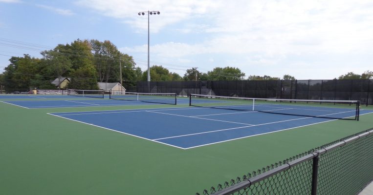 Landscape view of Hickman High School tennis courts.